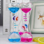 minuteur sablier liquide bicolore transparent motifs géométriques souriant deco moderne