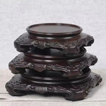 supports décoration bois sculpté artisanal traditionnel marron foncé fleurs vases bouddhas encens plantes bonsaï