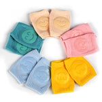 protège genoux bébé coton acrylique unisexe bleu clair jaune rose gris vert smiley brodés