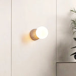 lampe murale moderne pierre gris clair beige texture granulée éclairage chambre entrée étude interrupteur
