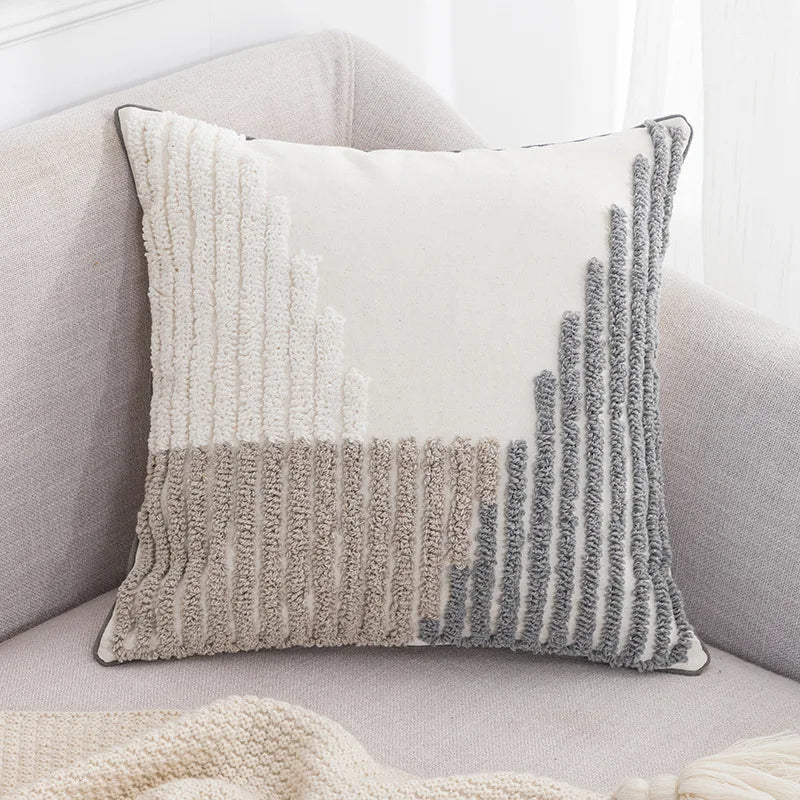 coussin brodé géométrique moderne toile coton couleur beige pompons décoratif