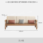 canapé places scandinave beige clair fauteuil pied poule moderne tapis géométrique terracotta blanc