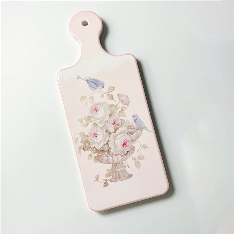 planche découper céramique vintage fleurs roses motifs géométriques blanc roseclair