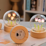veilleuse nuit tulipes rose pâle feuilles vertes base bois transparent moderne