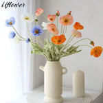 bouquet artificiel fleurs modernes rouge blanc bleu jaune vert feuilles vertes mariage anniversaire décoration