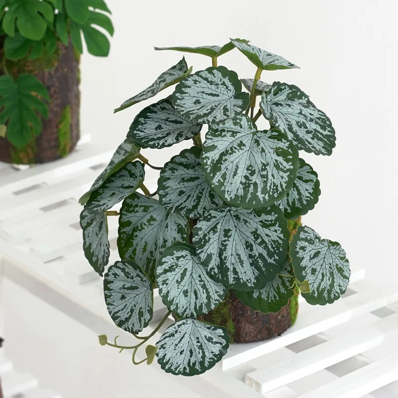 plantes artificielles feuilles vertes rouges noires modernes décoration extérieure mariage centro commercial exposées