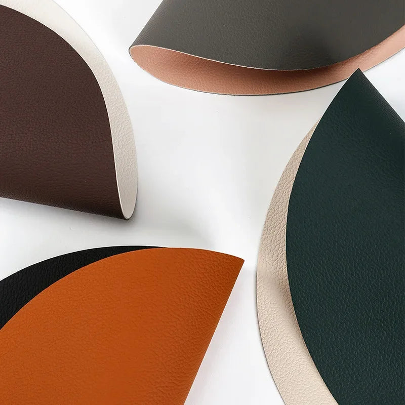 Set de table en cuir PU rond dans différentes couleurs : ivoire, noir et bleu