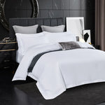lit chambre coucher literie blanc gris foncé moderne luxueux couverture taies oreiller drap set