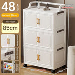 meuble rangement pliable blanc roulettes portes poignées dorées vêtements