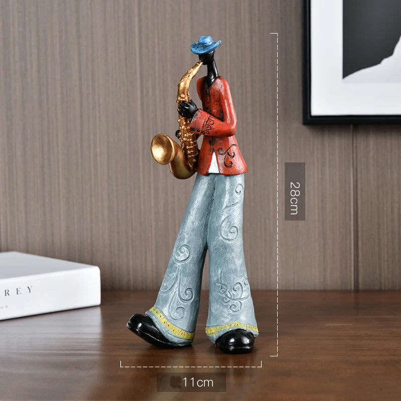 statues musiciens saxophone trompette ethniques motifs floraux bleu marron orange gris
