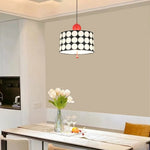 lampe suspendue moderne noire blanche rouge points blancs opacité chambre salonhôtel