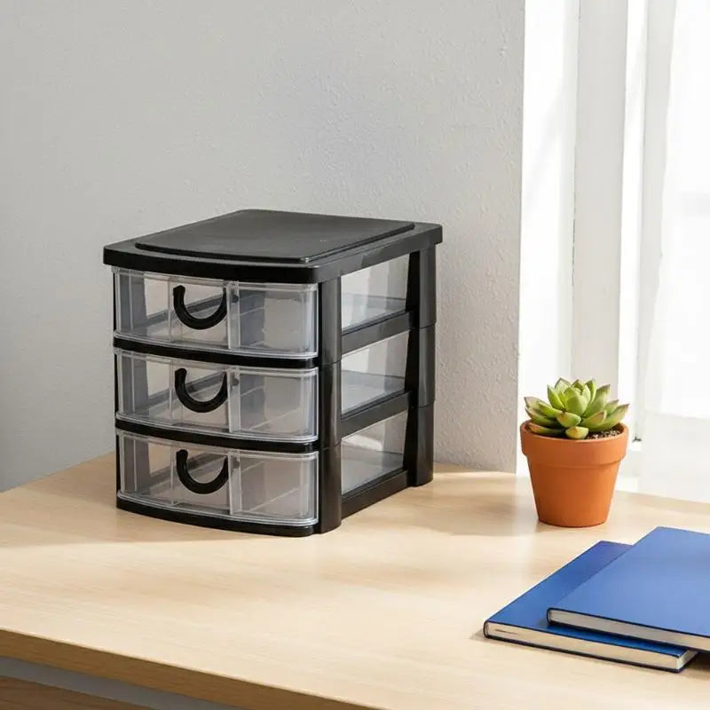 rangement tiroirs transparents meuble moderne noir câbles stylos crayons pot fleurs livres vases succulentes