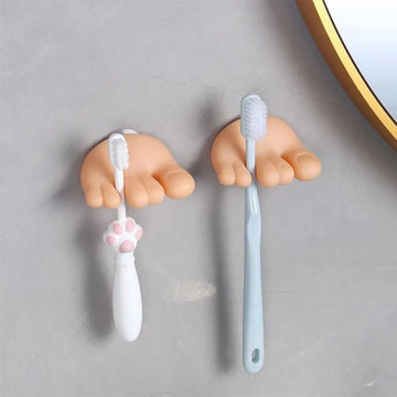 support brosses dents accessoires salle bain main humaine orange beige blanc gris bleu foncé