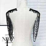 accessoire textile broche franges rouge or noir élégant chic festive decoration