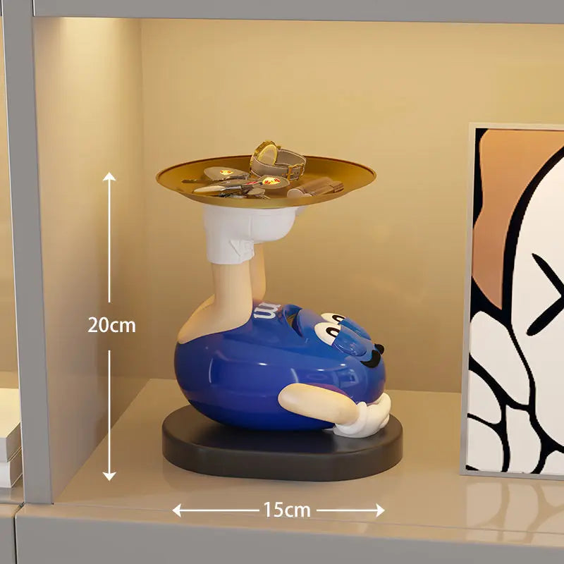 figurines cartoon personnages couleurs vert bleu orange jaune sourires maison salon chambre nordic