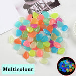 pierres fluorescentes bleu vert jaune rose modernes lisses jardin patio décor lumineux
