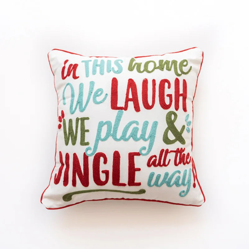 Ce coussin décoratif affiche un message joyeux et positif, incitant à rire, jouer et profiter de la vie au maximum.