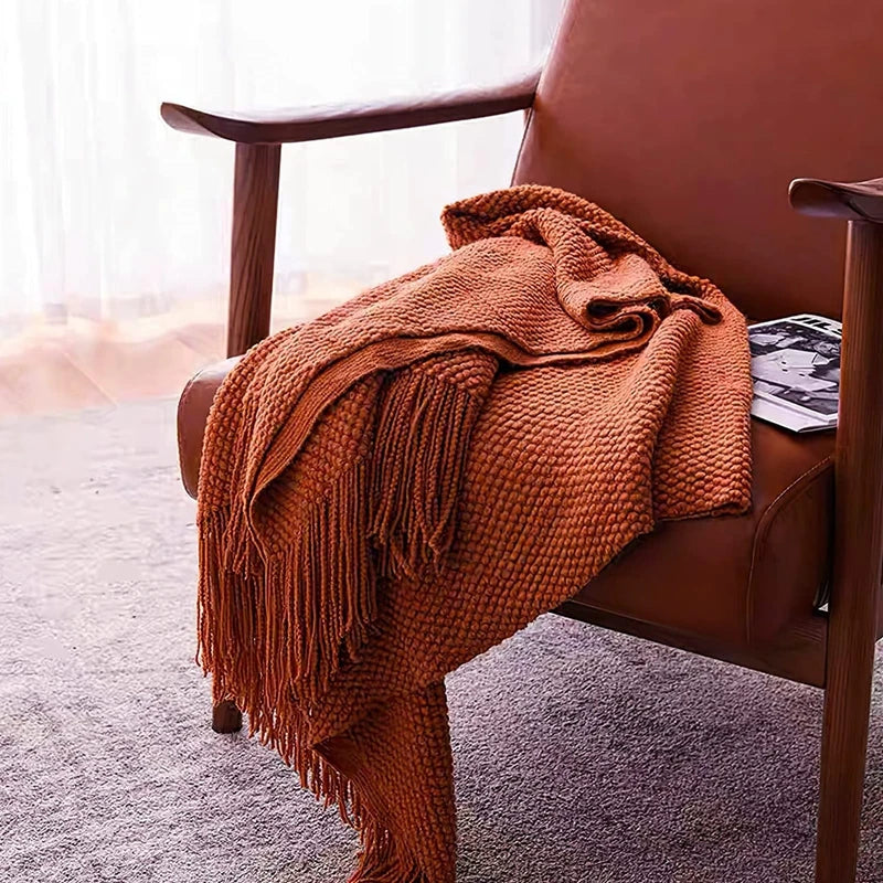 couverture lit orange motif waffle texture bulles confortable moderne canapé salon maison
