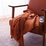 couverture lit orange motif waffle texture bulles confortable moderne canapé salon maison