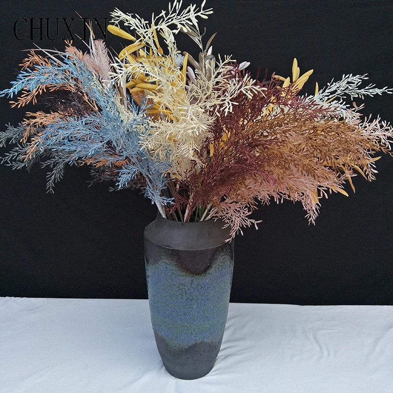 bouquet artificiel feuilles pointues couleur orange rose blanc moderne minimalisteextérieur décoration maison