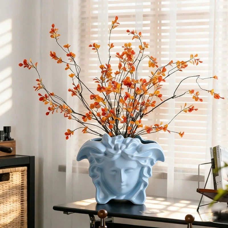vase résine bleu clair fleurs artificielles orchidée lotus roses feuillage classique décoration intérieure tête