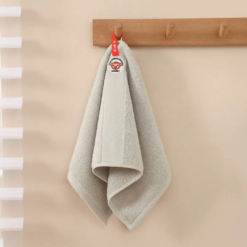serviette coton animaux brodés jaune gris enfant rapide absorbante face toilettage