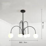 lustre moderne rouge noir doré sphères blanches opaques suspension salon chambre