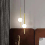 suspension luminaire moderne sphères translucides métal noir or chambre salon intérieur maison