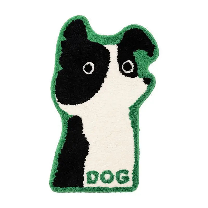 Un tapis en forme de chien noir et blanc sur un fond vert, avec le mot "DOG" écrit en dessous.