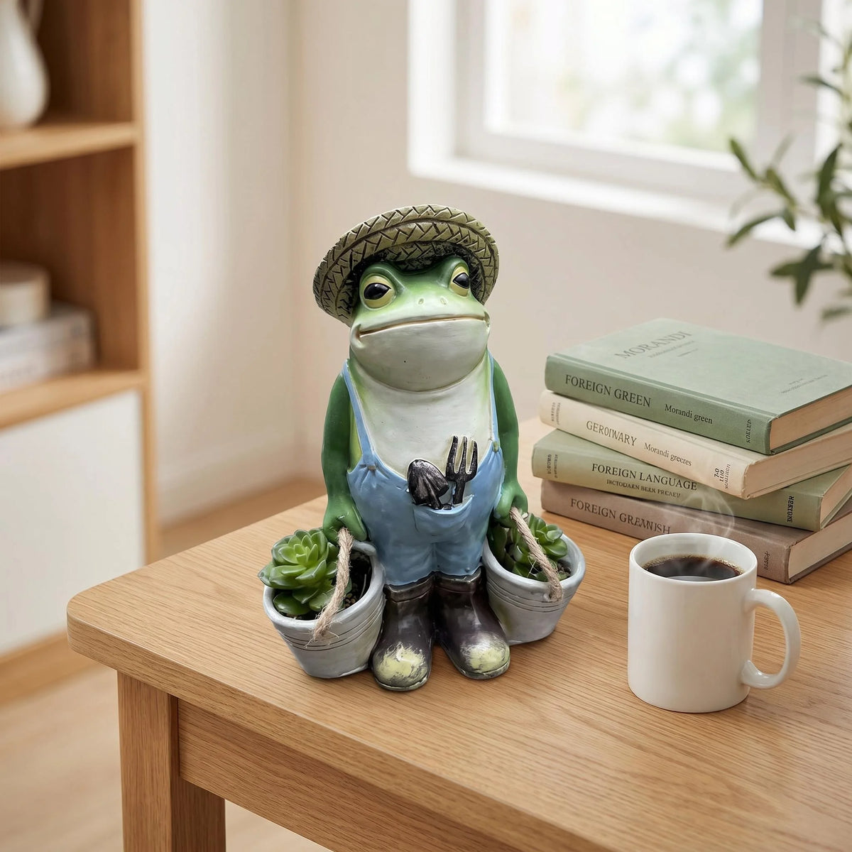 statue grenouille jardinier chapeau paille succulentes outils fourche pelle décoration jardin intérieur