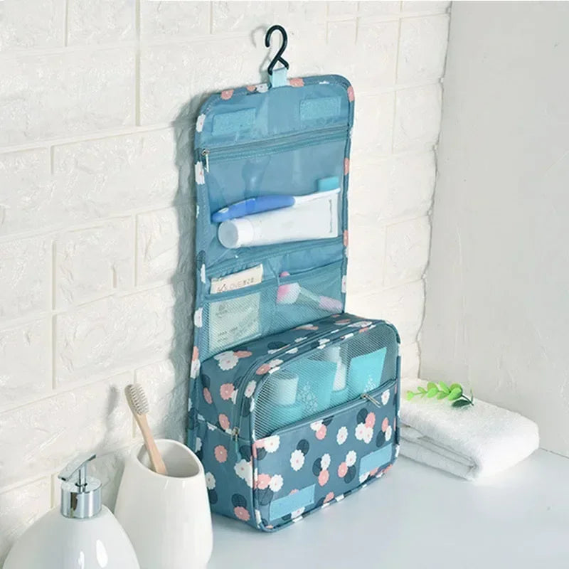 Sac toilette pliable oxford imprimé floral bleu clair motifs blancs roses bleus moderne pratique