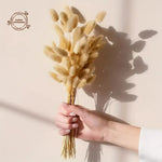 décoration intérieure bouquet plumes séchées rose pâle naturel rustique anniversaire baby shower chambre