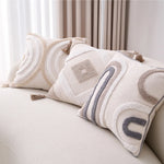 taies d'oreiller bohèmes géométriques texturées coussins décoratifs modernes pompons beige gris doré blanc