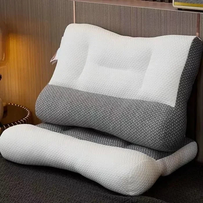 oreiller cervical ergonomique gris blanc texture tissée moderne contour arrondi fixations