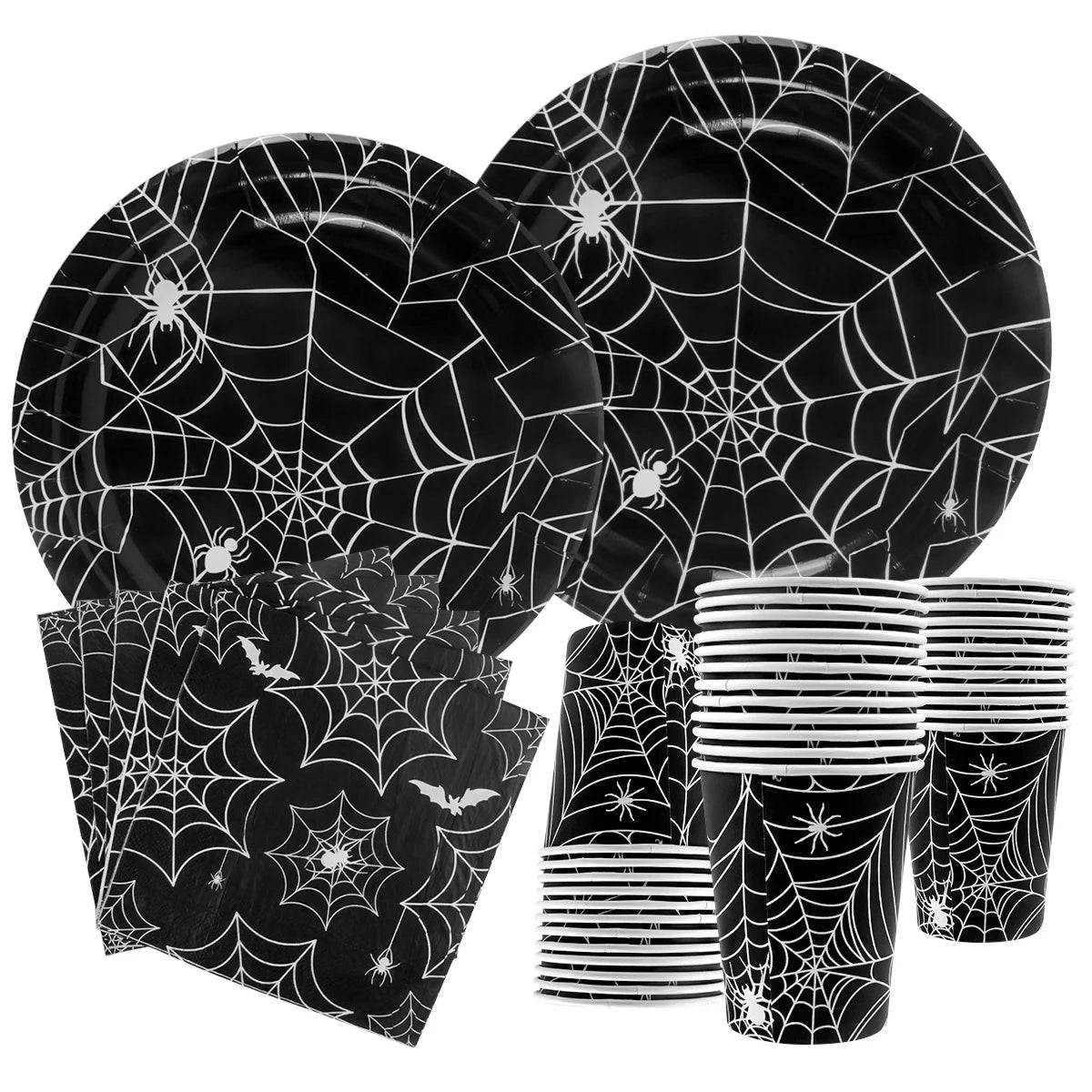 assiettes halloween araignées verres serviettes table noire blanc points brillants toile festive octobre