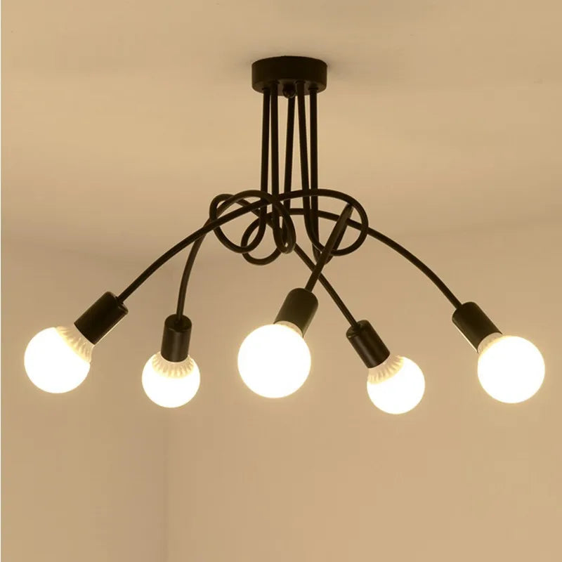 suspension lumineuse moderne noir doré ampoules blanches structure spirale fixation câbles métallique