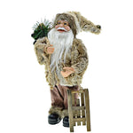 Statue Père Noël entourée de décorations de table de Noël