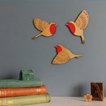 décoration murale oiseaux bois orange bleu noir motifs floraux artisanal