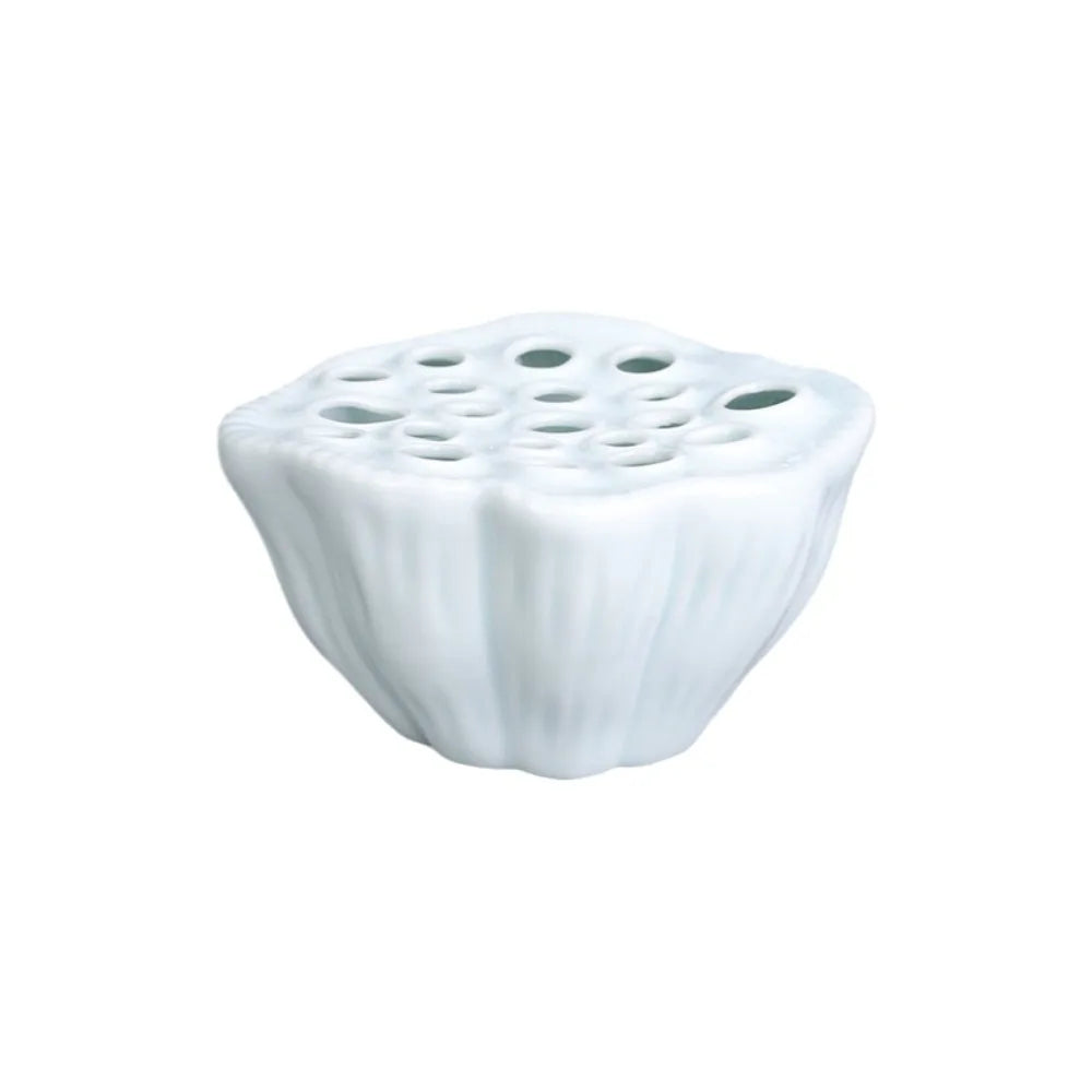 cache pot porcelaine bleu clair rose pâle vert pastel motifs perforations texture ondulée moderne