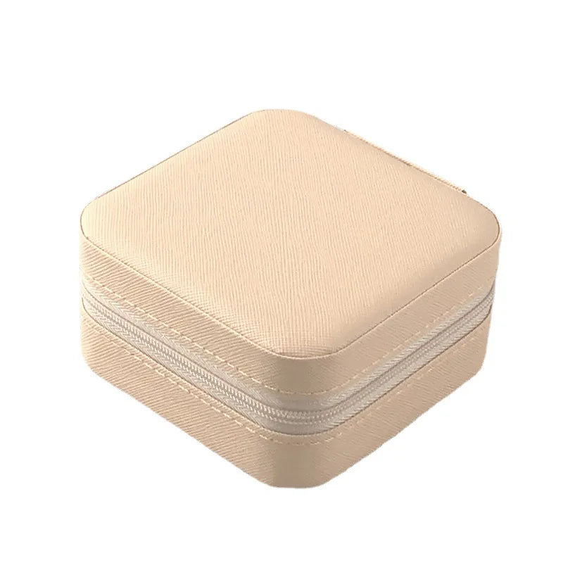 boîte bijoux simili cuir vert pastel moderne fermeture glissière blanc rose pâle boucles doreilles