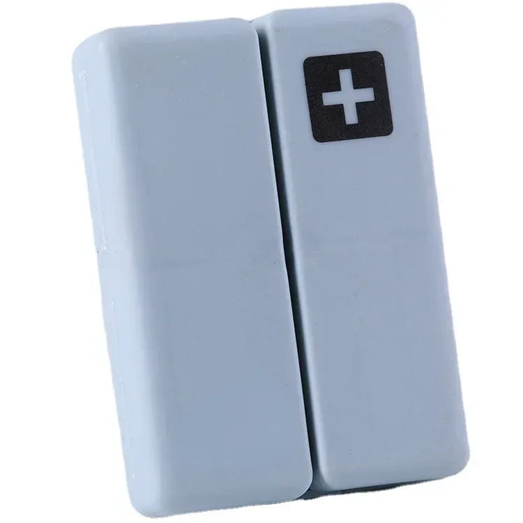 boîte pilules hebdomadaire compartiments couleurs pastel croix blanche moderne pratique