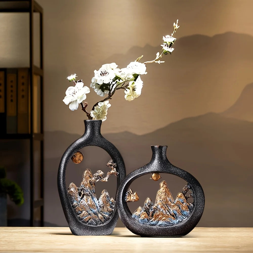 vase decoratif noir paysage montagneux relief texture mate eucalyptus branches fleurs minimalistes