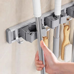 support mural porte balai gris moderne adhésif brosse balai serviette gant flacon salle bain