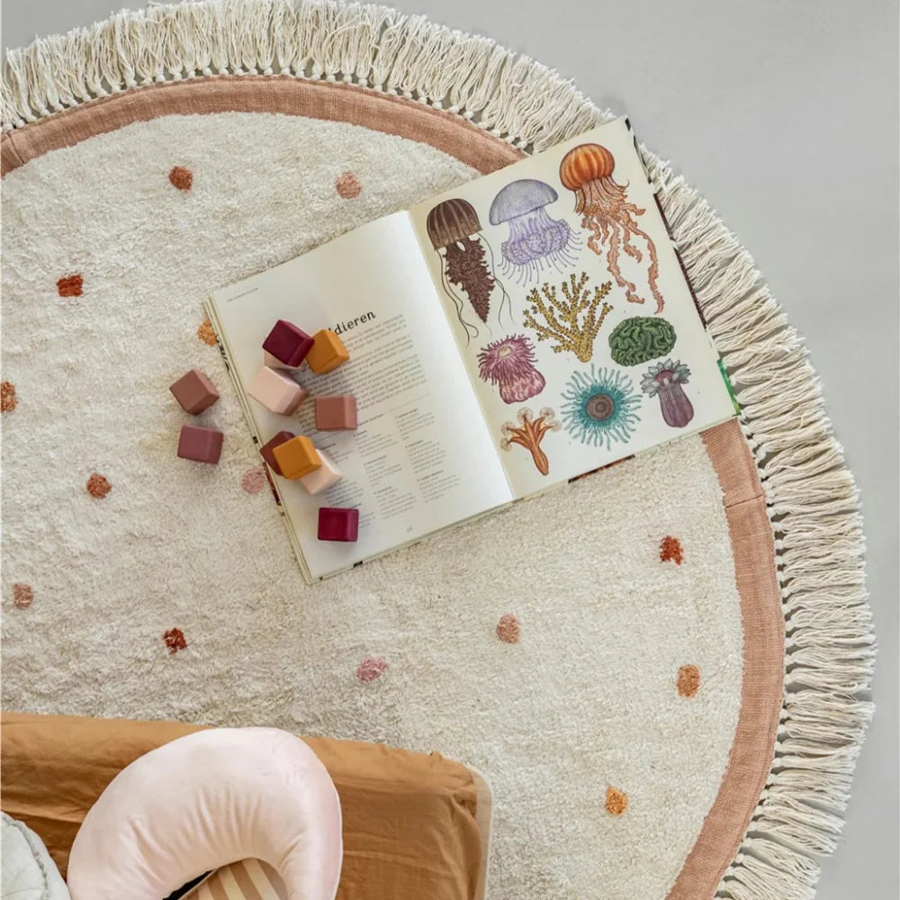 tapis moderne doux rose pâle points différents tailles couleurs bordure frisée salon chambre bébéextérieur
