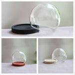vase boule verre transparent base bois couvercle fleurs séchées