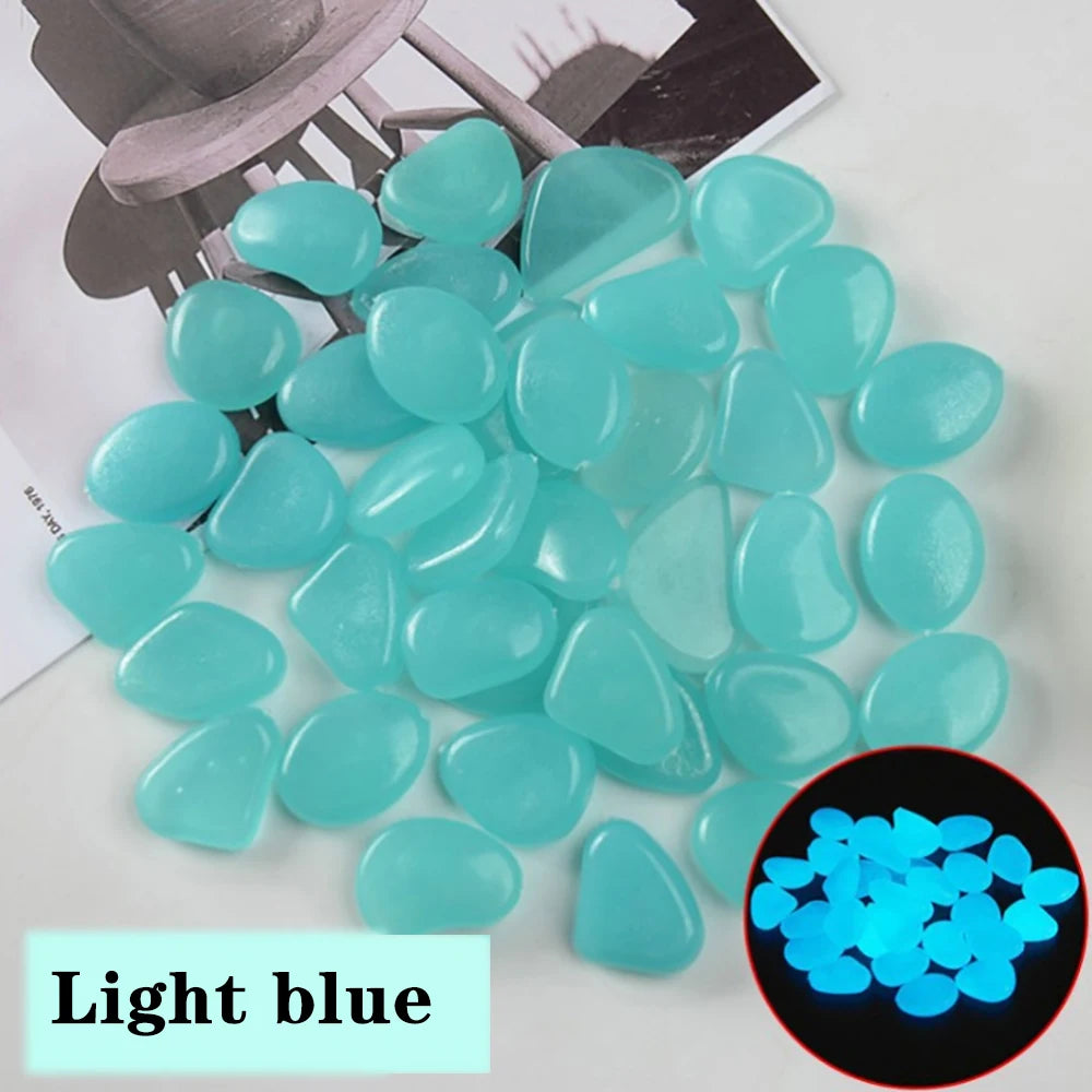 pierres fluorescentes bleu vert jaune rose modernes lisses jardin patio décor lumineux