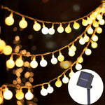 guirlandes lumineuses solaires led jaune orangé boules rondes patio jardin decoration nocturne modes auto