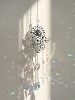 décoration jardin boho hamsa cristal prismes bleu argent transparent lumière capturante