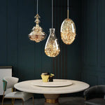 suspension lumineuse moderne transparente dorées câble suspendu élégante led trois couleurs chambre principale