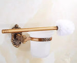 accessoires salle bain doré ornements sculptés finition brillante antique élégant porte serviettes savon toilette